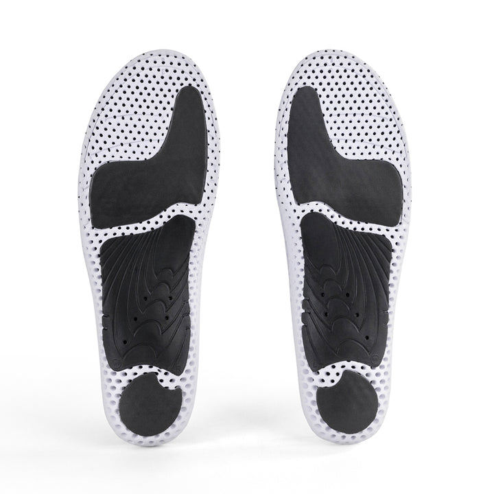 Vue de la base de la paire de semelles GOLFPRO profil moyen avec support d'articulation noir, coussinet de talon noir, coussinet d'amorti noir pour l'avant-pied, base blanche et noire #1-choix-devotre-profil_med